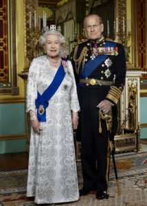 Official Diamond Jubilee portrait of HM The Queen and HRH The Duke of Edinburgh photographed in the Centre Room of Buckingham Palace. in this portrait taken to mark the 60th anniversary of The Queen's Accession. The Queen is wearing a state dress by the designer Angela Kelly and the State Diadem crown. She is wearing Queen Victoria's Collet Necklace, worn for Queen Victoria on the occasion of her own Diamond Jubilee. The sash in the blue Garter Riband. The Duke of Edinburgh is wearing Royal Navy ceremonial day dress (admiral of the Fleet) with Garter Sash. Embargoed until 0001am Monday February 6th 2012.